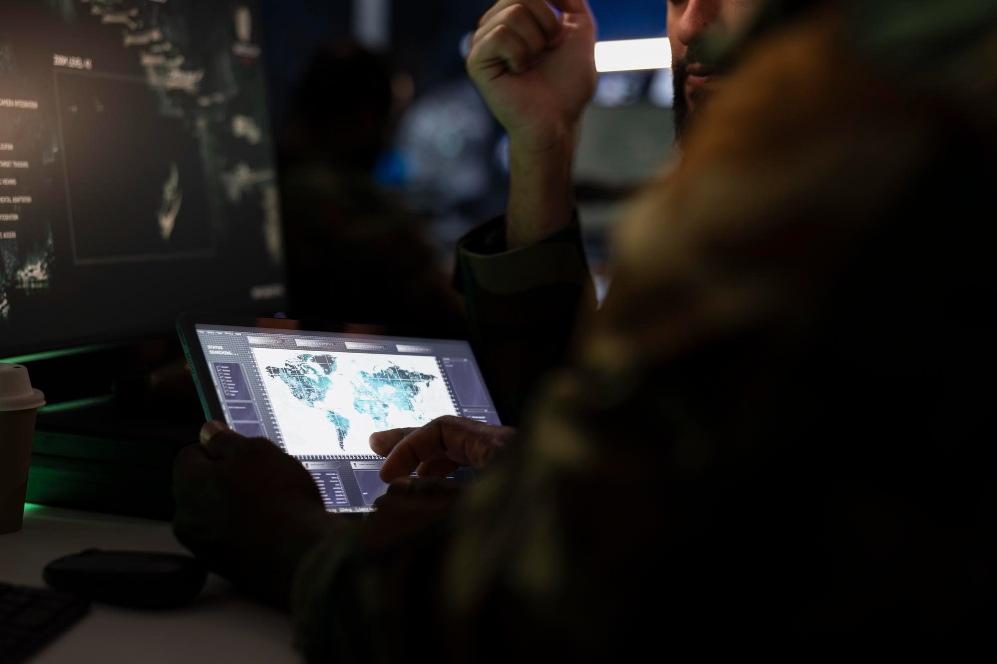 Operator reviewing a situational map on a tablet